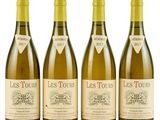 three bottles of white wine sitting next to each other on a white surface