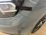 a sticker that says vauto on the back of a car