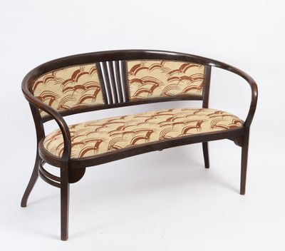 an image of a wooden bench with a patterned upholstered seat