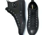 black converse sneakers with black laces on a white background