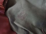 a close up of a piece of fabric on a bed