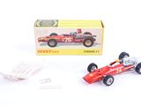 a red toy race car with a box on the side