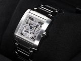 a close up of a watch on a black watch band