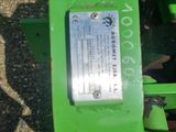 a close up of a green tractor with a sign on it