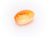 a yellow oplite gems on a white background