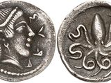 une pièce d'argent sur laquelle figurent une femme et une pieuvre