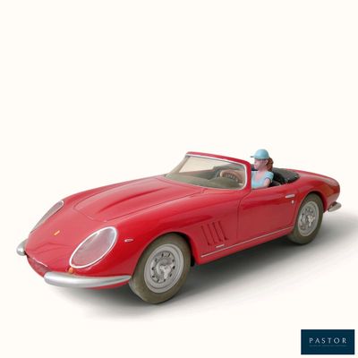 Modèle 3D d'une voiture de sport rouge avec un homme au volant