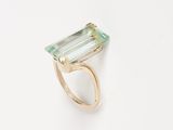 an image of a ring with a green tourmaline stone