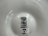 a white plate with a black and white design on it