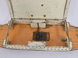 an old suitcase that is sitting on a white surface