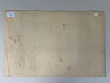 an old piece of paper that is hanging on the wall