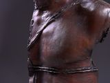 sculpture of a man ' s torso with a hat on his head