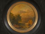 painting of a landscape in a black frame with a gold border