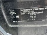 a close up of a car ' s license plate on the back of a vehicle