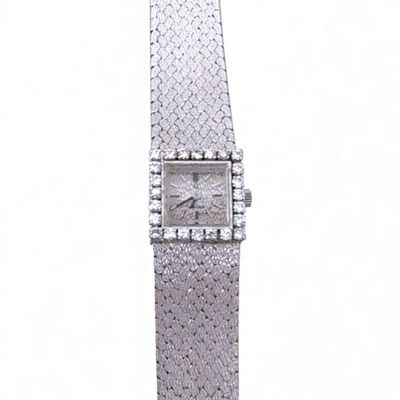 MONTRE bracelet de dame en or gris la lunette carrée sertie de petits  - Photo 1