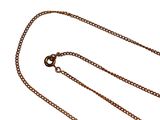 a gold chain with a heart on it on a white background
