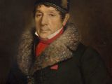 portrait d'un homme vêtu d'un manteau noir à col de fourrure
