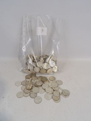 a bag full of coins sitting on a table