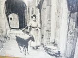 a black and white photo of a woman and a cow