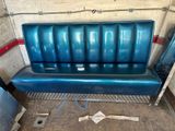 an image of a blue bench in a garage