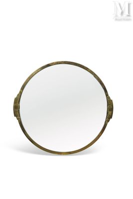 a close up of a mirror on a white surface with a white background