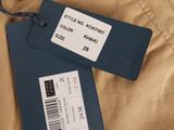 khaki khaki pants with a tag on the side