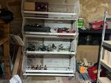 a room that has a bunch of shelves in it