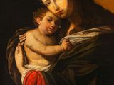 a painting of a woman holding a child in her arms