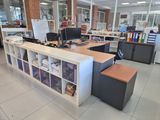 an image of an office with a desk and a chair