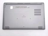 the back of a laptop with the bottom cover partially open