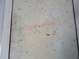 a picture of a picture of someone writing on the wall