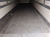 an image of the inside of a truck with the door open