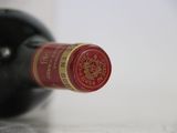 a bottle of wine that is sitting on a table