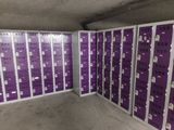 a room with a bunch of purple boxes in it