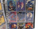 a binder that has a bunch of comics on it