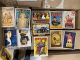 a box full of old movie posters on the floor