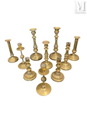 a group of candles that are sitting on a table