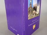 purple book with a picture of a cathedral in the middle of it