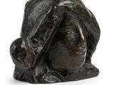 statue of a man with a hat on his head