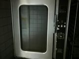 an image of a commercial oven in a dark room