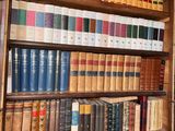 many books on the shelves in the room