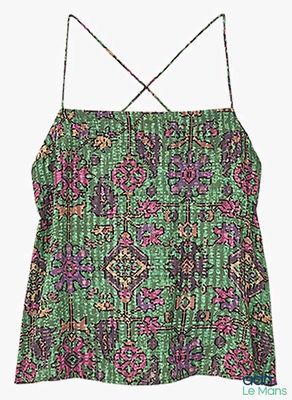 a green and pink top with a floral pattern on it