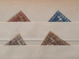 a picture of a piece of paper with different colored triangles on it