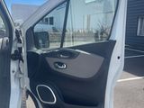 the door of a car is open and the door is closed