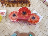 many different types of hair accessories laid out on a table