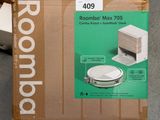 packaging of a cardboard box with a picture of a robot on it