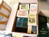 a box full of books sitting on a table