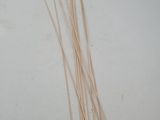 a lot of sticks that are laying on a table