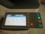 an image of a multi function printer with a touch screen
