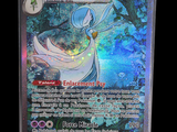 a close up of a pokemon card on a black background